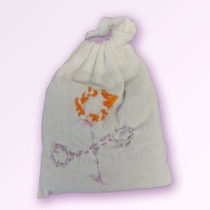 Embroidered in orange and purple thread Lavender Bag by Kweku