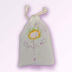 Embroidered in orange and purple thread Lavender Bag by Kweku